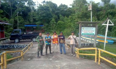 Dukung Program Pemerataan Pembangunan, Babinsa Koramil 1710-06/Agimuga Dampingi Konsultan Proyek Pengaspalan Jalan di Lokasi