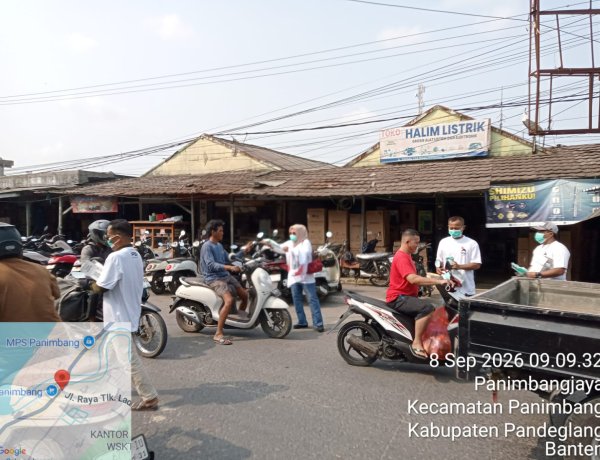 Sasar Nelayan dan Pedagang, PSI Pandeglang Bagi Masker Gratis di Panimbang